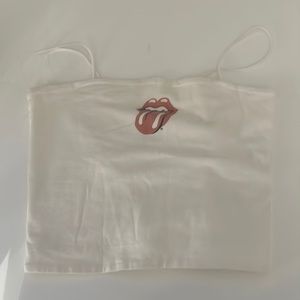 White tank top with image of tounge on it